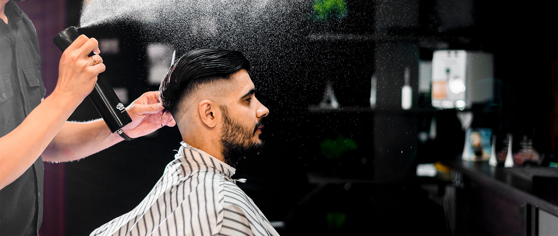 Stylist maintaining a mens hair system