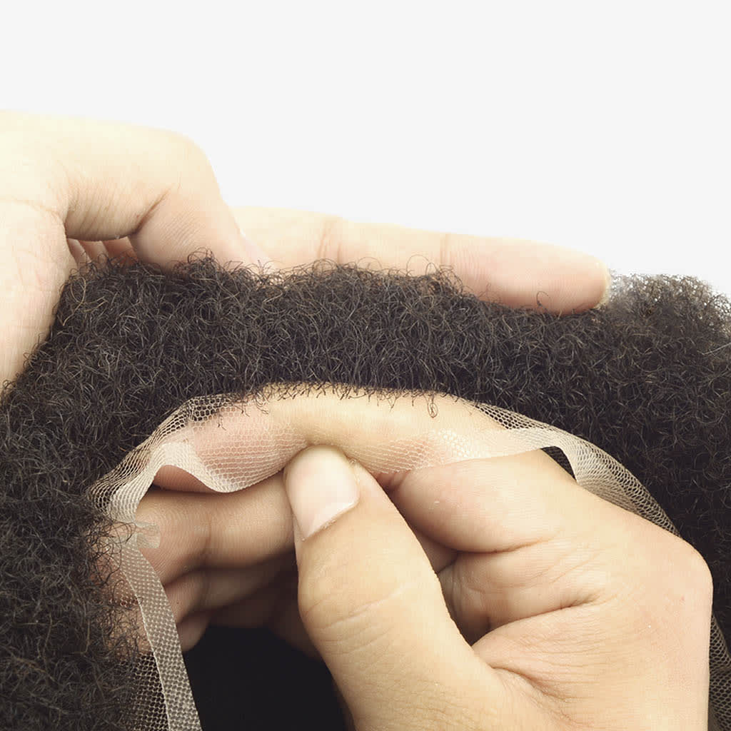 Top view of Afro Lace hair system showing full French lace base and curl pattern